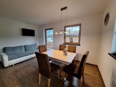 Ein Sitzbereich in der Unterkunft Appartements Höpfl