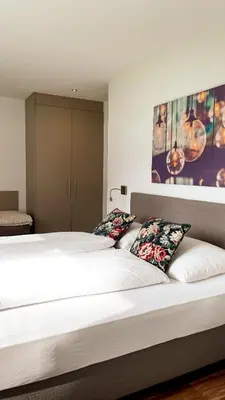 Ein Bett oder Betten in einem Zimmer der Unterkunft TheView Ahorn
