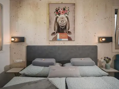 Ein Bett oder Betten in einem Zimmer der Unterkunft Vergissmeinnicht