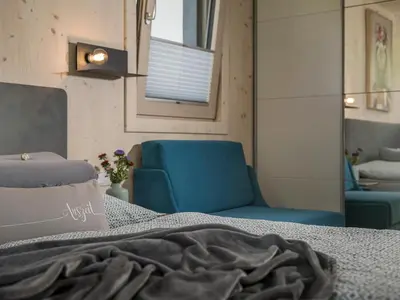 Ein Bett oder Betten in einem Zimmer der Unterkunft Vergissmeinnicht