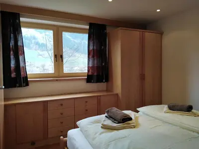 Ein Bett oder Betten in einem Zimmer der Unterkunft Ferienwohnung Geisler