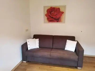 Ein Sitzbereich in der Unterkunft Ferienwohnung Geisler
