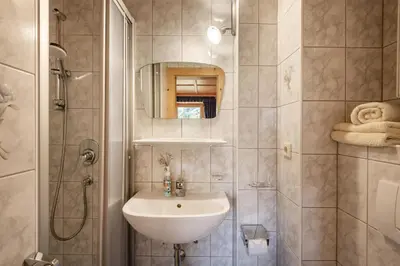 Ein Badezimmer in der Unterkunft Ferienwohnung - Schmirnerhof
