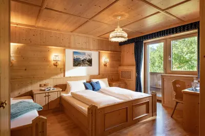 Ein Bett oder Betten in einem Zimmer der Unterkunft Ferienwohnung - Schmirnerhof
