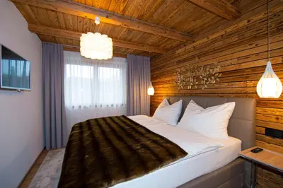 Ein Bett oder Betten in einem Zimmer der Unterkunft Appartement Enzian & Mark