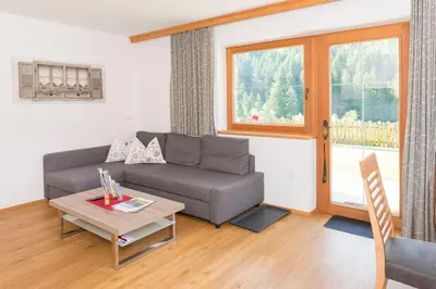 Ein Sitzbereich in der Unterkunft Appartement Hausberger