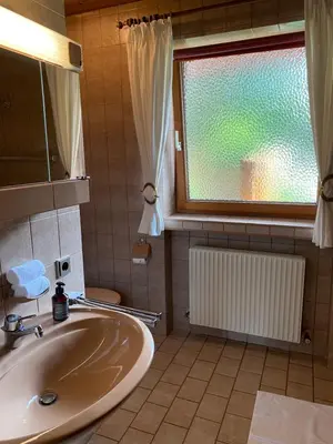 Ein Badezimmer in der Unterkunft Ferienwohnung an der Familienabfahrt