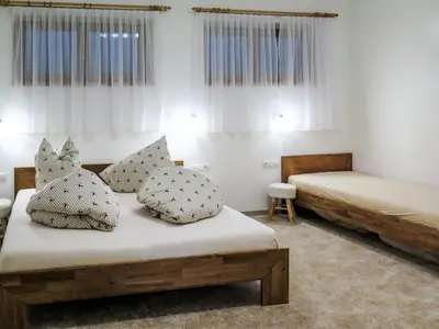 Ein Bett oder Betten in einem Zimmer der Unterkunft Apartment Luxner-6 by Interhome