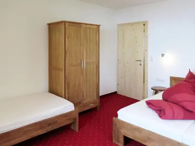 Ein Bett oder Betten in einem Zimmer der Unterkunft Apartment Luxner-5 by Interhome