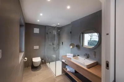Ein Badezimmer in der Unterkunft Hotel Hennersberg