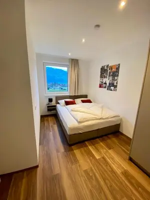 Ein Bett oder Betten in einem Zimmer der Unterkunft TheView Hamberg
