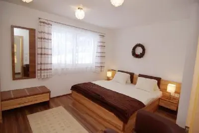 Ein Bett oder Betten in einem Zimmer der Unterkunft Chalet Schiestl