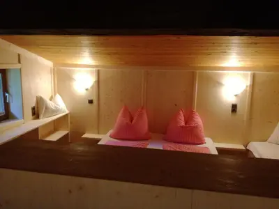 Ein Bett oder Betten in einem Zimmer der Unterkunft Tanterhütte by Tanterhof