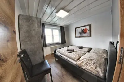 Ein Bett oder Betten in einem Zimmer der Unterkunft Ambiento Tirol