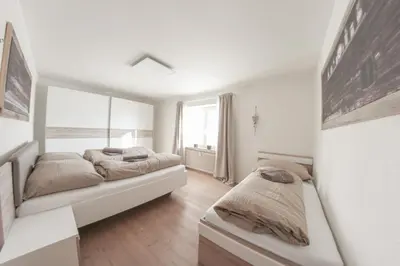 Ein Bett oder Betten in einem Zimmer der Unterkunft Ambiento Tirol