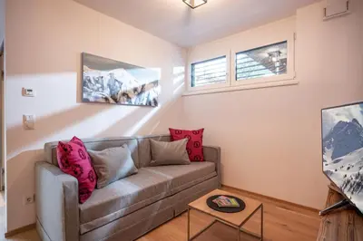 Ein Sitzbereich in der Unterkunft Kaiser Appartement Brixen im Thale