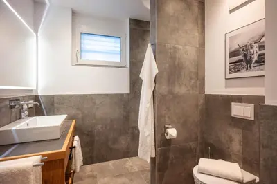Ein Badezimmer in der Unterkunft Kaiser Appartement Brixen im Thale