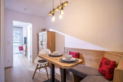 Ein Sitzbereich in der Unterkunft Kaiser Appartement Brixen im Thale