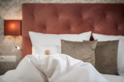 Ein Bett oder Betten in einem Zimmer der Unterkunft Emma's kleines Hotel