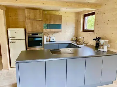 Küche/Küchenzeile in der Unterkunft Alpen-Chalets Achensee