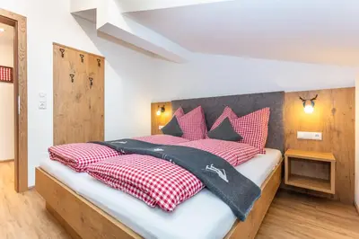 Ein Bett oder Betten in einem Zimmer der Unterkunft Ferienwohnungen Unterhof