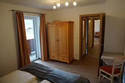 Ein Bett oder Betten in einem Zimmer der Unterkunft Appartementhaus Hüttenberger