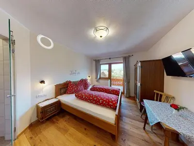Ein Bett oder Betten in einem Zimmer der Unterkunft Bauernhof Bichlhof