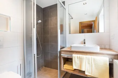 Ein Badezimmer in der Unterkunft Appartements Hochlega