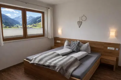 Ein Bett oder Betten in einem Zimmer der Unterkunft Ferienwohnung Marina - Schwendau bei Mayrhofen