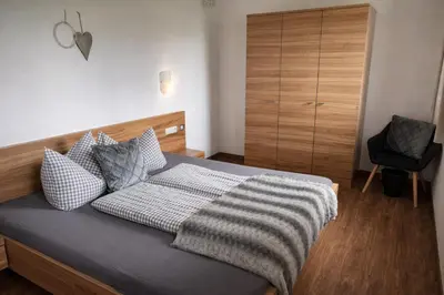 Ein Bett oder Betten in einem Zimmer der Unterkunft Ferienwohnung Marina - Schwendau bei Mayrhofen