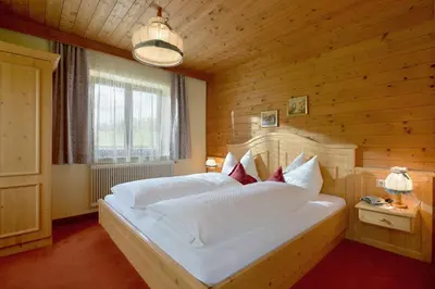 Ein Bett oder Betten in einem Zimmer der Unterkunft Bauernhof Strasserhof