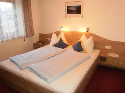 Ein Bett oder Betten in einem Zimmer der Unterkunft Bauernhof Strasserhof