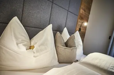 Ein Bett oder Betten in einem Zimmer der Unterkunft Chalet Dirndl und Buam