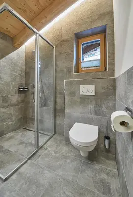 Ein Badezimmer in der Unterkunft Chalet Dirndl und Buam