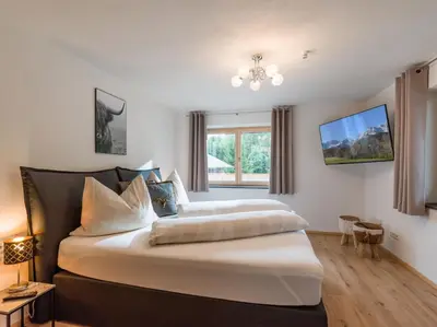 Ein Bett oder Betten in einem Zimmer der Unterkunft Ferienhaus Paula