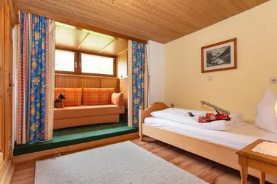 Ein Bett oder Betten in einem Zimmer der Unterkunft Pension Sonneck