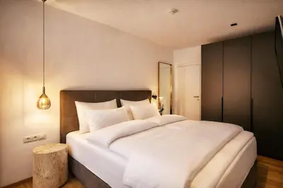 Ein Bett oder Betten in einem Zimmer der Unterkunft ZILLER DELIGHT - by AlpenLuxus Collection