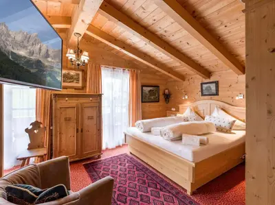 Ein Bett oder Betten in einem Zimmer der Unterkunft Chalets Berglehen