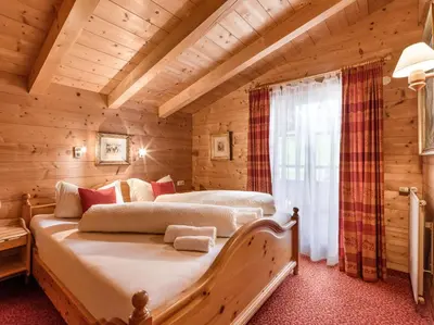 Ein Bett oder Betten in einem Zimmer der Unterkunft Chalets Berglehen