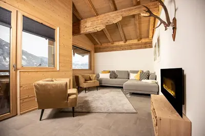 Ein Sitzbereich in der Unterkunft Naturlodge Tirol - Naturverbunden im Zillertal