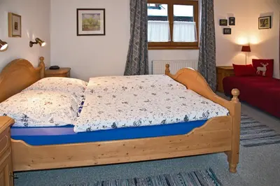 Ein Bett oder Betten in einem Zimmer der Unterkunft Haus Savoy - Appartement 4