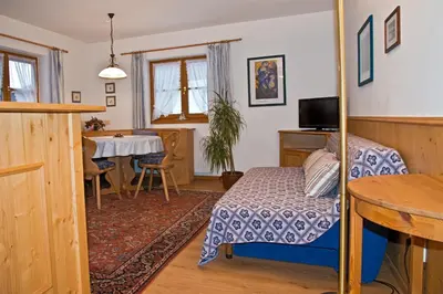 Ein Bett oder Betten in einem Zimmer der Unterkunft Haus Savoy - Appartement 4