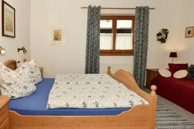 Ein Bett oder Betten in einem Zimmer der Unterkunft Haus Savoy - Appartement 4