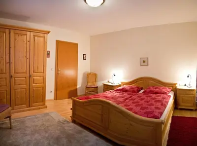 Ein Bett oder Betten in einem Zimmer der Unterkunft Haus Savoy - Appartement 2