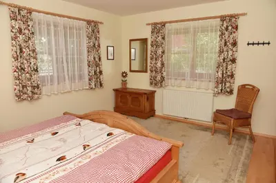 Ein Bett oder Betten in einem Zimmer der Unterkunft Haus Savoy - Appartement 2
