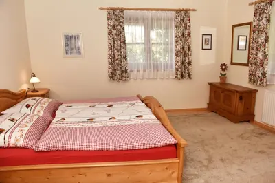 Ein Bett oder Betten in einem Zimmer der Unterkunft Haus Savoy - Appartement 2