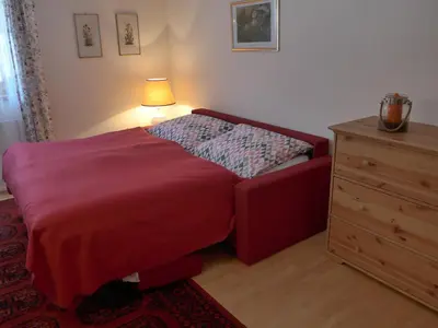 Ein Bett oder Betten in einem Zimmer der Unterkunft Haus Savoy - Appartement 2