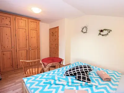 Ein Bett oder Betten in einem Zimmer der Unterkunft Apartment Laura by Interhome