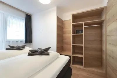 Ein Bett oder Betten in einem Zimmer der Unterkunft Apart Alina