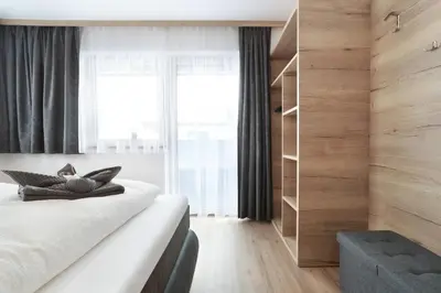 Ein Bett oder Betten in einem Zimmer der Unterkunft Apart Alina